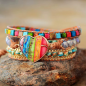 Preview: Handgefertigtes 7-Chakren Wickelarmband mit Herz in Edelstahlfassung